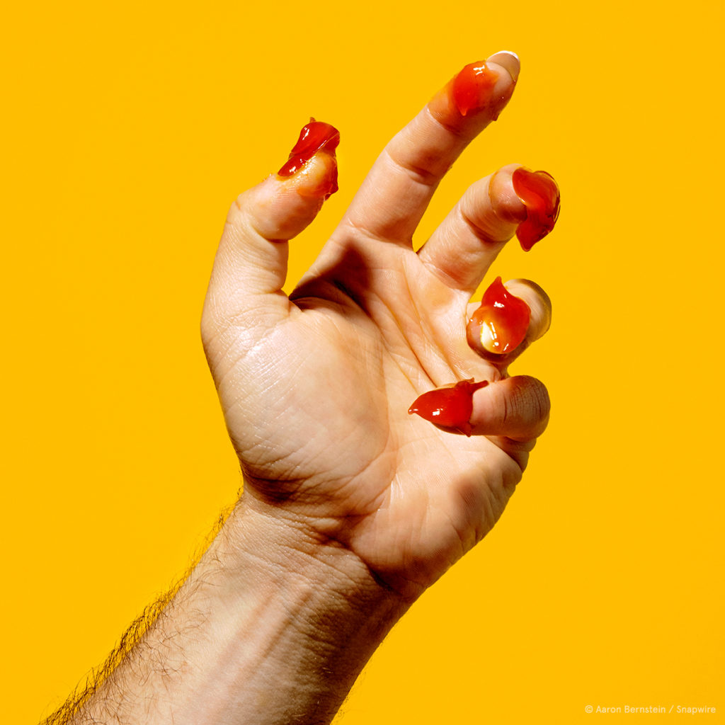 hand portrait with ketchup for nails