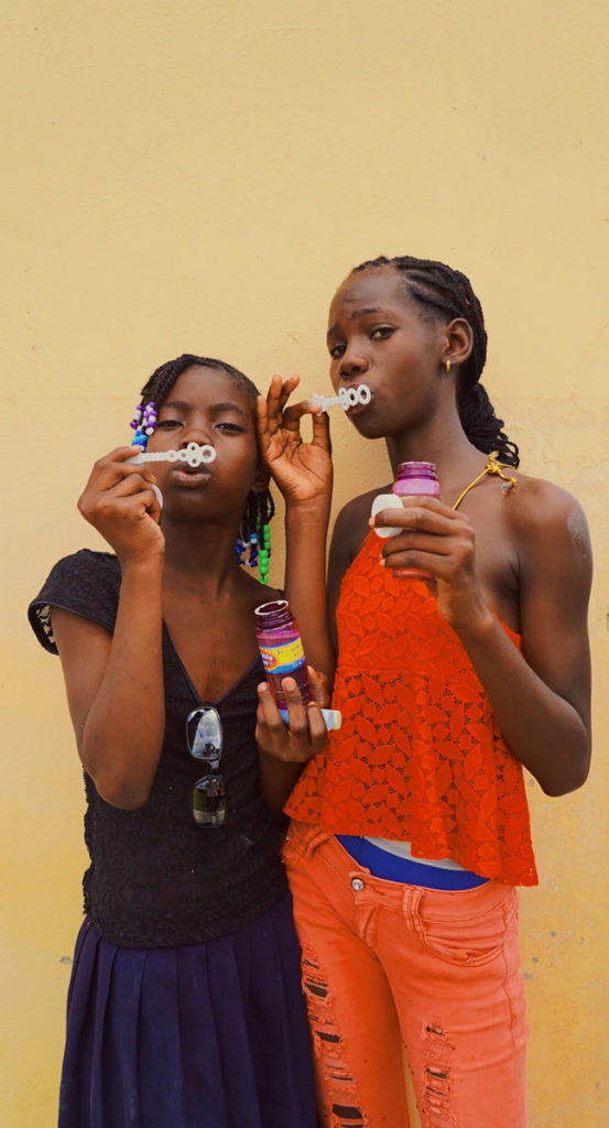 portrait blowing bubbles