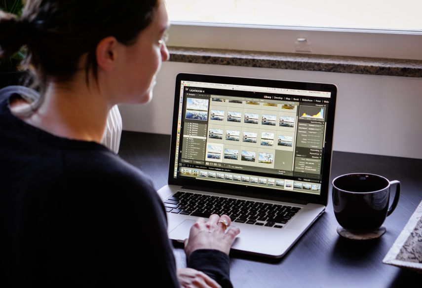 girl looking right working on computer