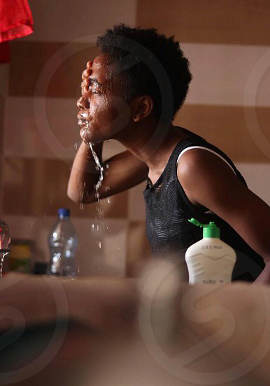 portrait girl washing face