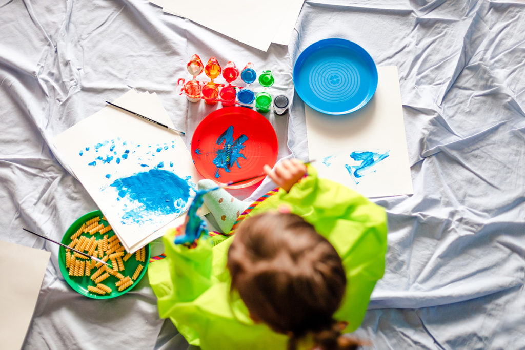 overhead shot of girl painting 