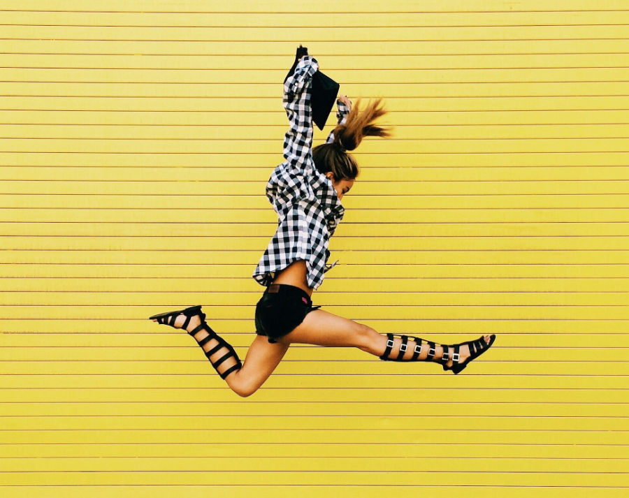 female jumping in air during visual content production