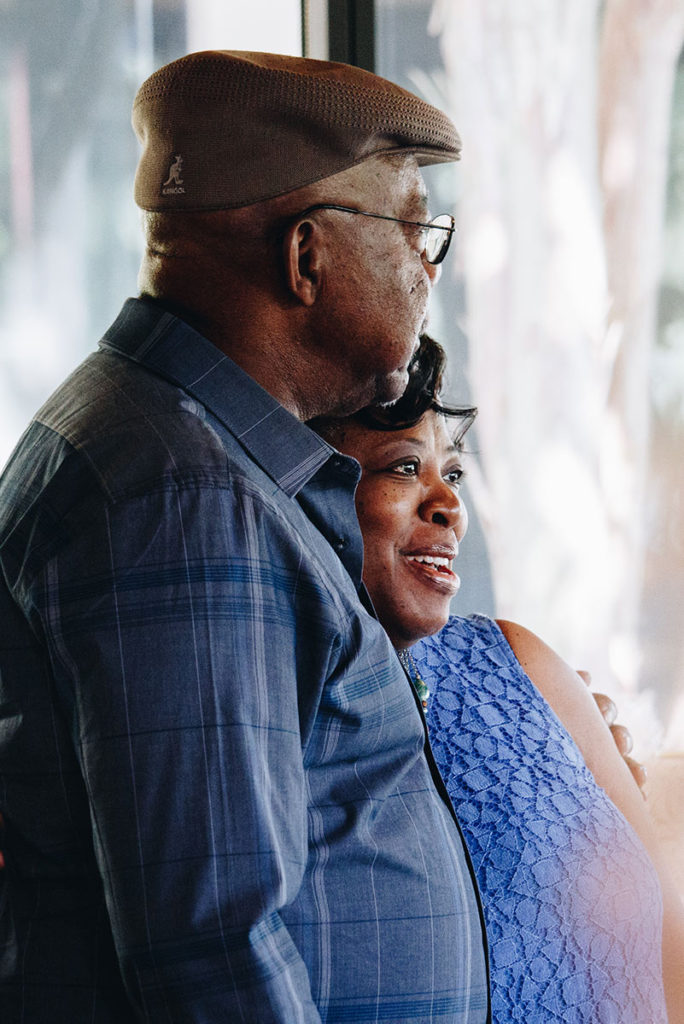 portrait older couple hugging